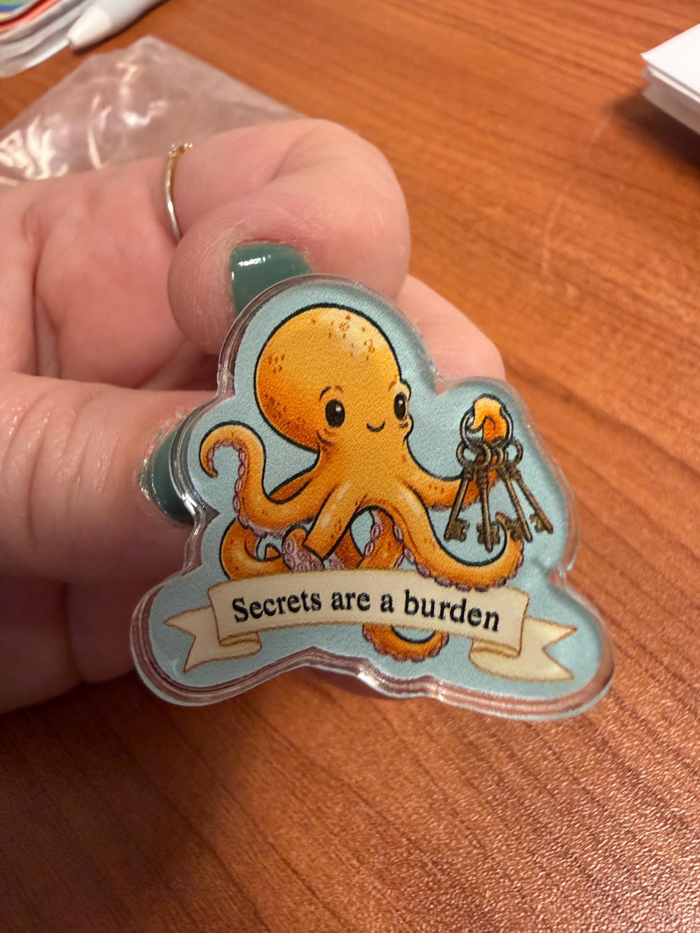 Marcellus the Octopus Acrylic Pin | "Secrets Are a Burden" Quote | Remarkably Bright Creatures Bookish Pin | Literary Pin | Reader Gift