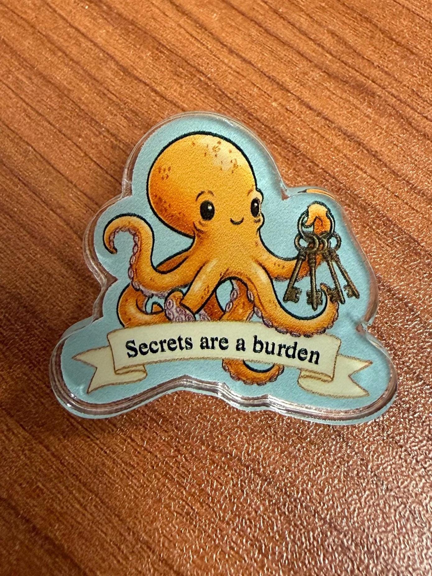 Marcellus the Octopus Acrylic Pin | "Secrets Are a Burden" Quote | Remarkably Bright Creatures Bookish Pin | Literary Pin | Reader Gift